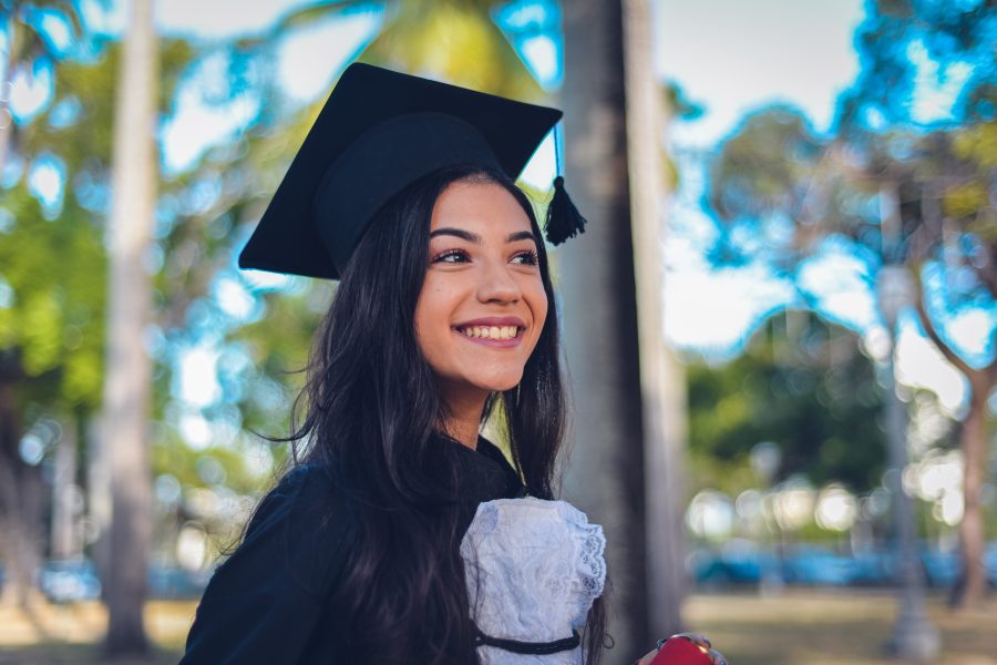 Graduate in cap and gown