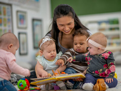 Care giver with babies